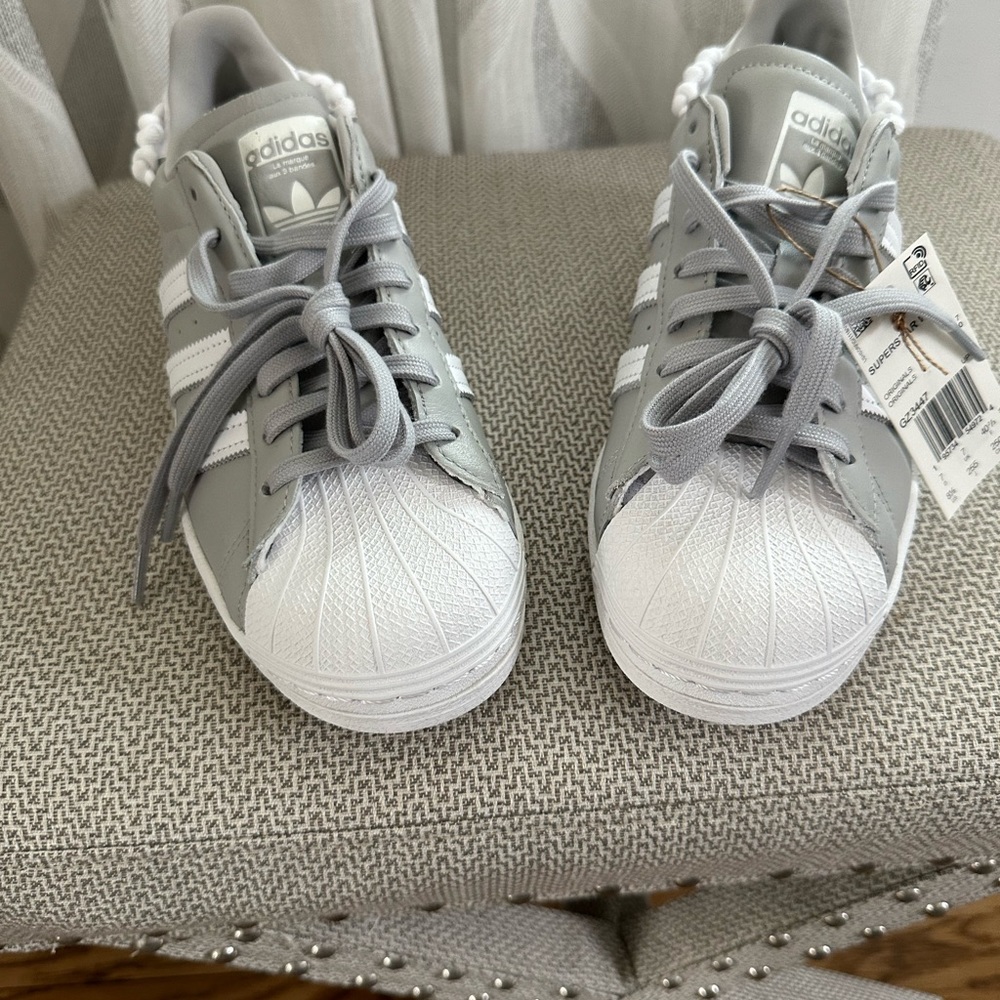Brand new never used Adidas Superstar sneaker size 8.5